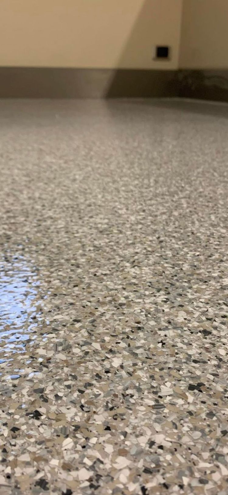 A close up of a concrete floor in a room