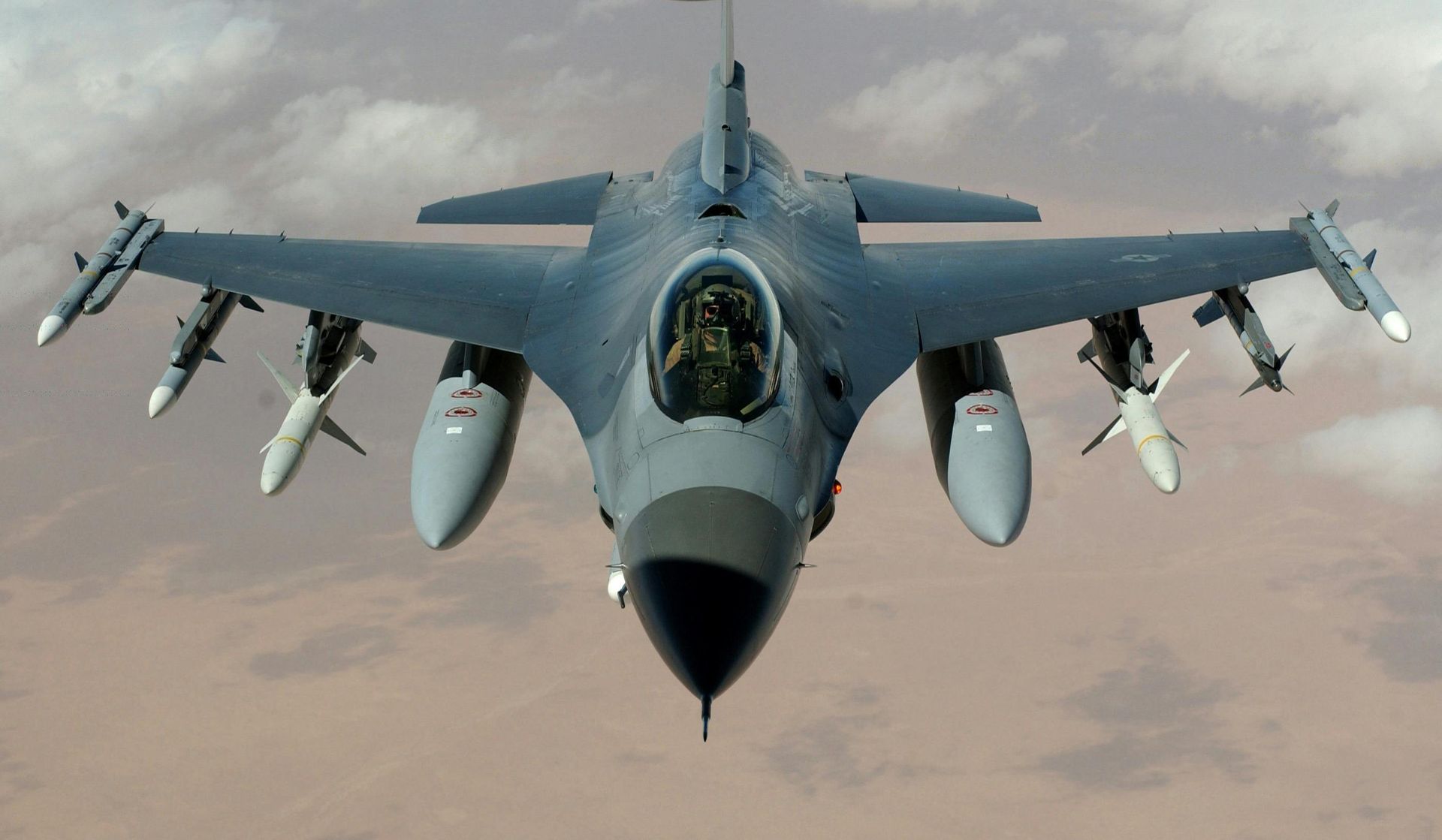 view of an F22 jet flying straight towards the camera