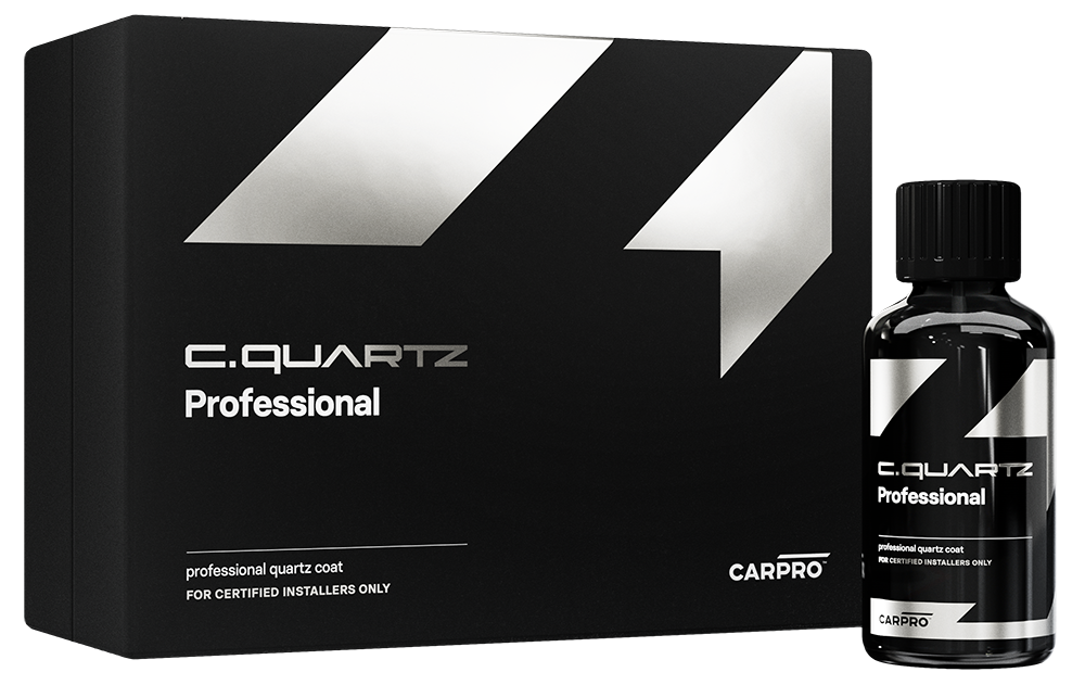 A bottle of c.quartz professional is next to a box.