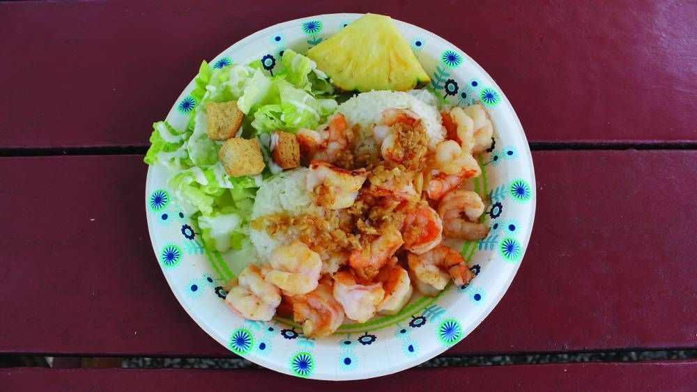 Enjoy a heaping plate of garlic shrimp—and a dose of aloha—at Big Wave Shrimp