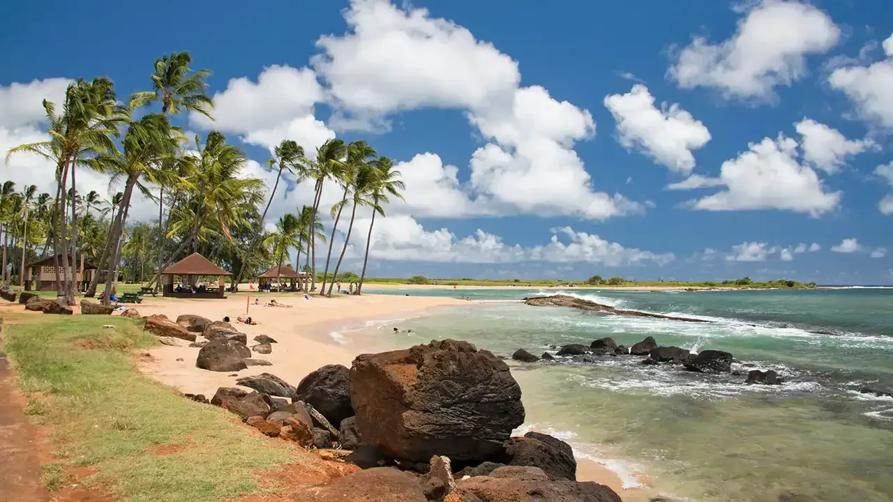 Discover the information you need to know before visiting Poipu Beach, Kauai, Hawaii.