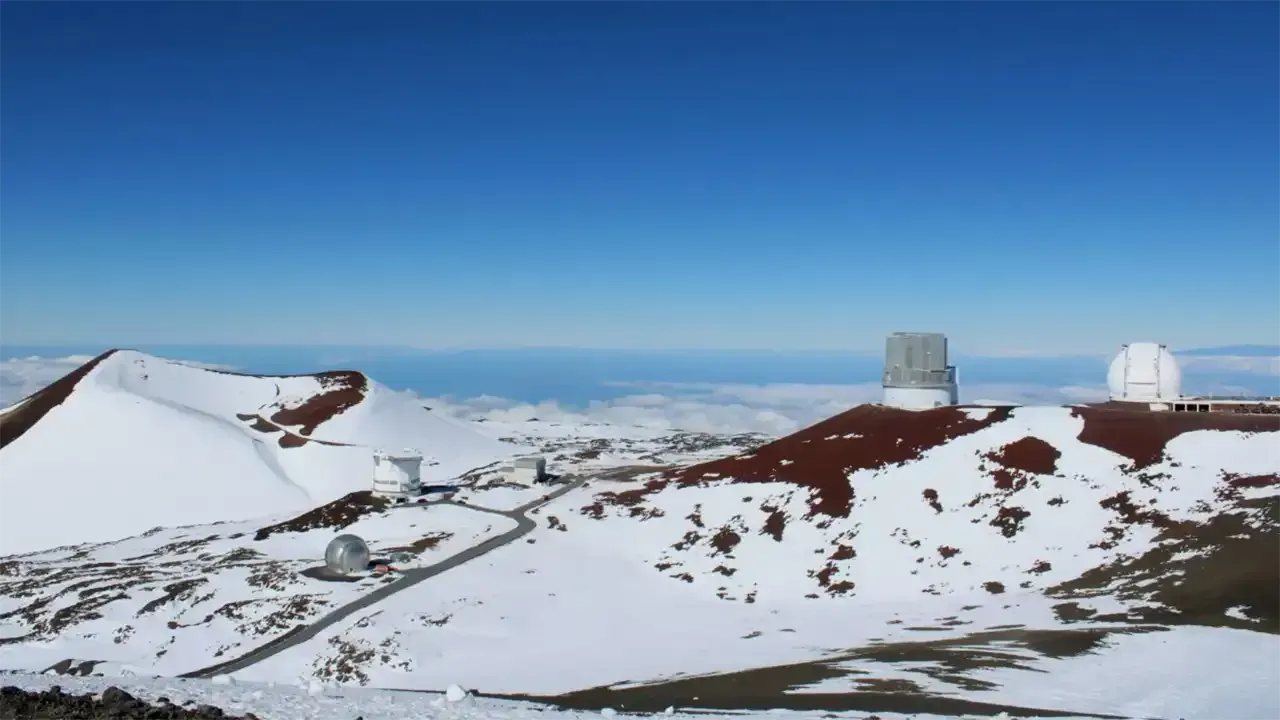 The peak of Mauna Kea on the big island of hawaii covered in snow