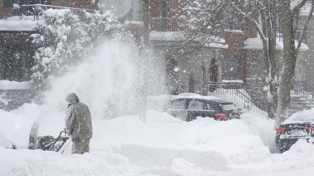 Snow blower in blizzard