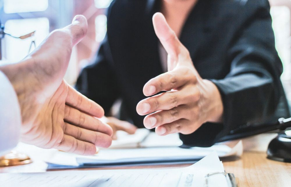 Financial Advisor Shaking Hands