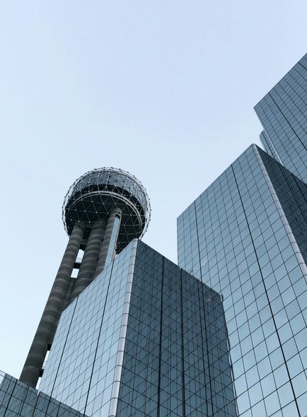 A very tall building with a very tall tower on top of it.