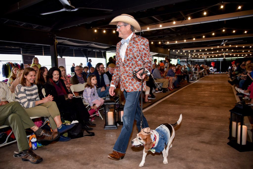 Model runway Cowboys and a Beagle dressed in look alike attire