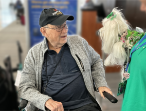 Grateful elderly man has his eyes on Maggi the Maltese