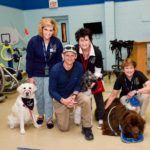 Director of Cedar Lake Lodge in the photo with three therapy teams