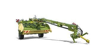 A light green Krone disc mower for agricultural use, shown on a plain white background.