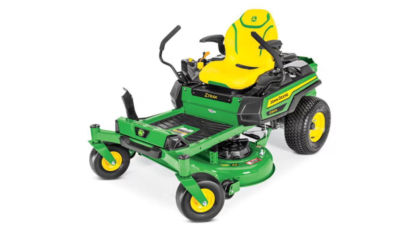 A green and yellow John Deere Z330R zero-turn riding lawn mower on a white background.