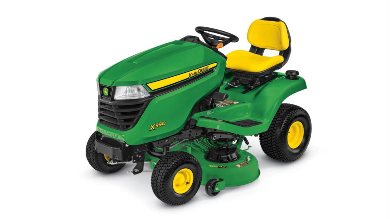 A green and yellow John Deere Z315E zero-turn riding lawn mower on a white background.