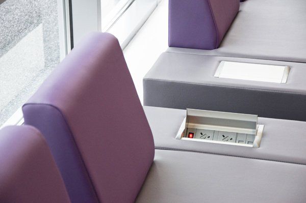 vinyl sofas with integrated power and data modules