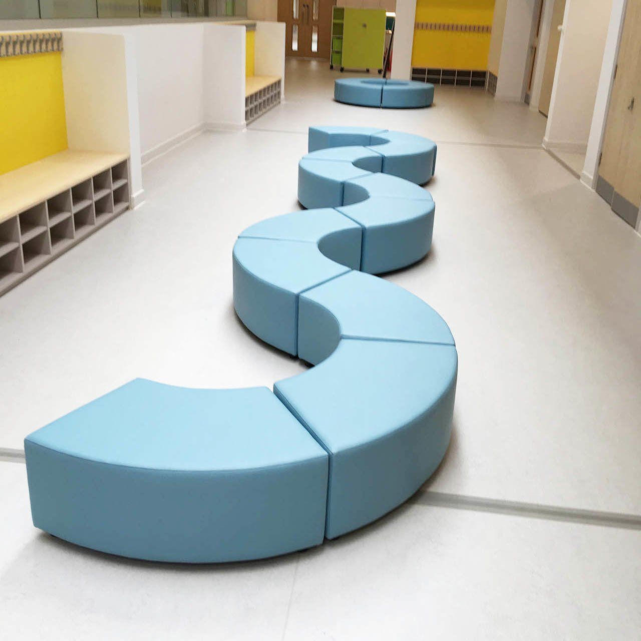 Vinyl modular pod stools in curved confifuration