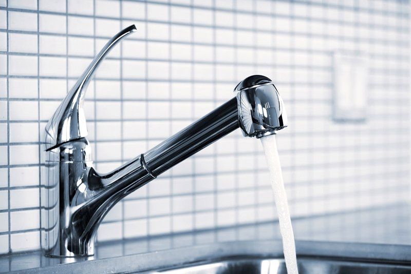 Running Water from a Faucet — Michigan Plumbing — Lansing, MI