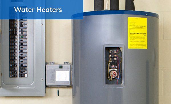 A newly installed water heater sits in the corner, awaiting with fiery anticipation to warm some water.