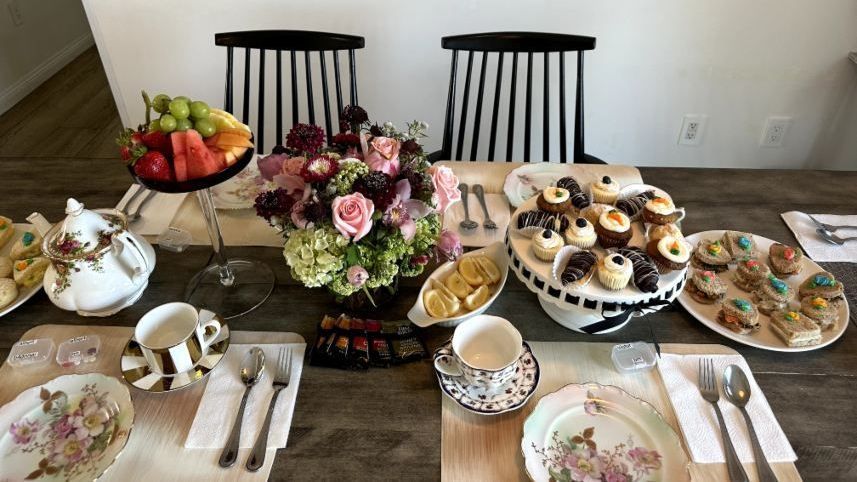 Tea party table set with pastries and fruit. Coral Tree Care Home assisted living near Palos Verdes Estates, CA.