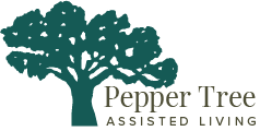 Green tree logo for Pepper Tree Assisted Living.