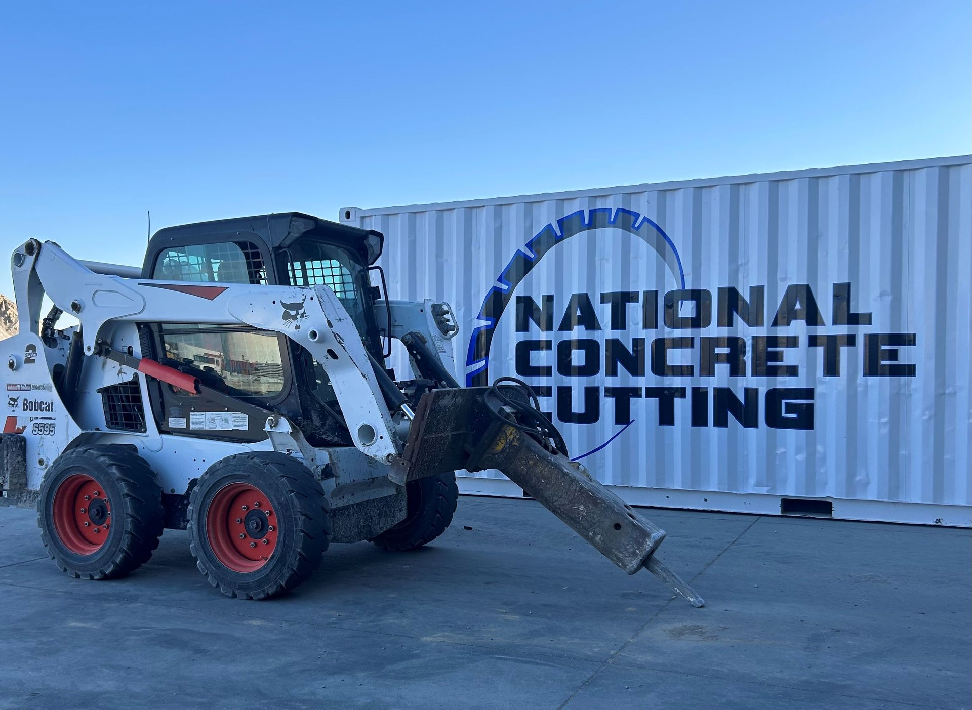 Skilled worker demolishing interior wall performing concrete breaking service in Omaha, NE. Skilled worker demolishing interior wall performing concrete breaking service in Omaha, NE.