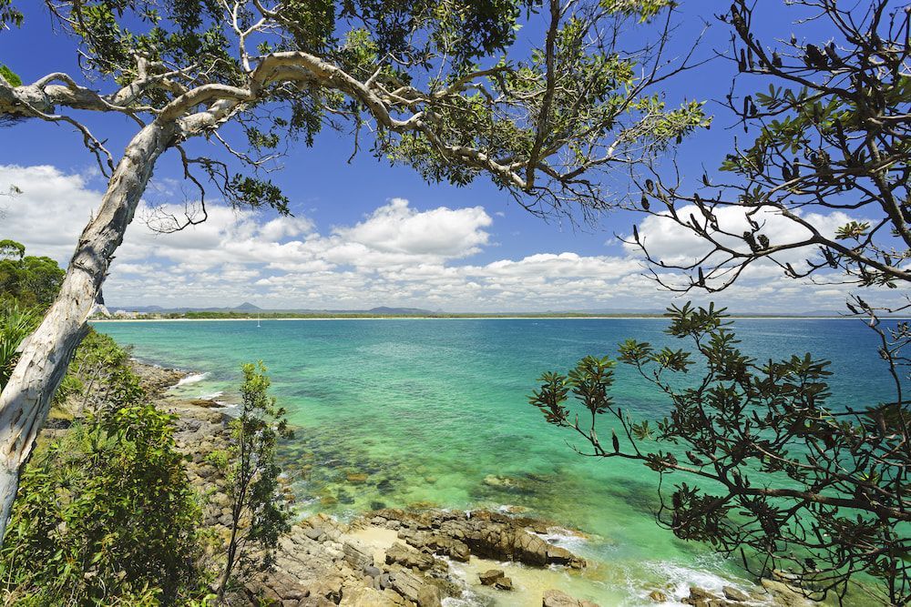 Two Air Conditioners Are Sitting on Top of a Roof — Davies Refrigeration & Air Conditioning in Noosa, QLD