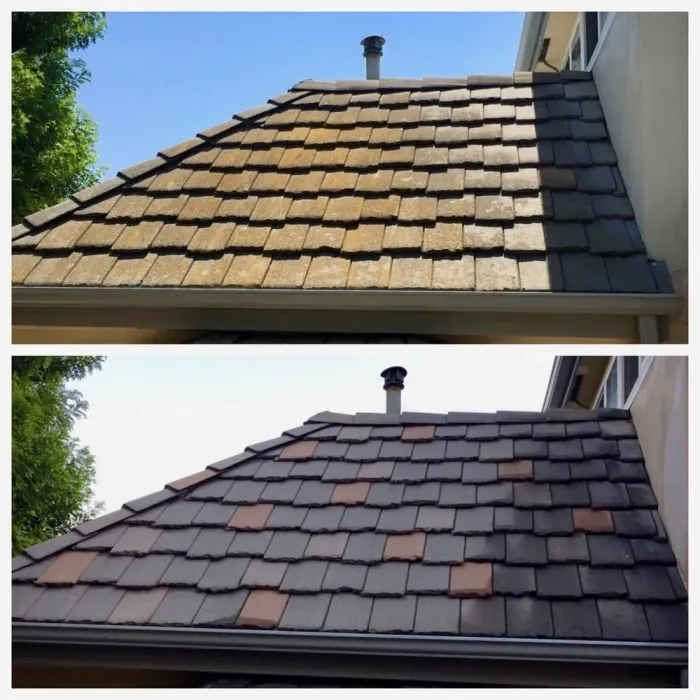 A brick house with a roof that has shingles on it