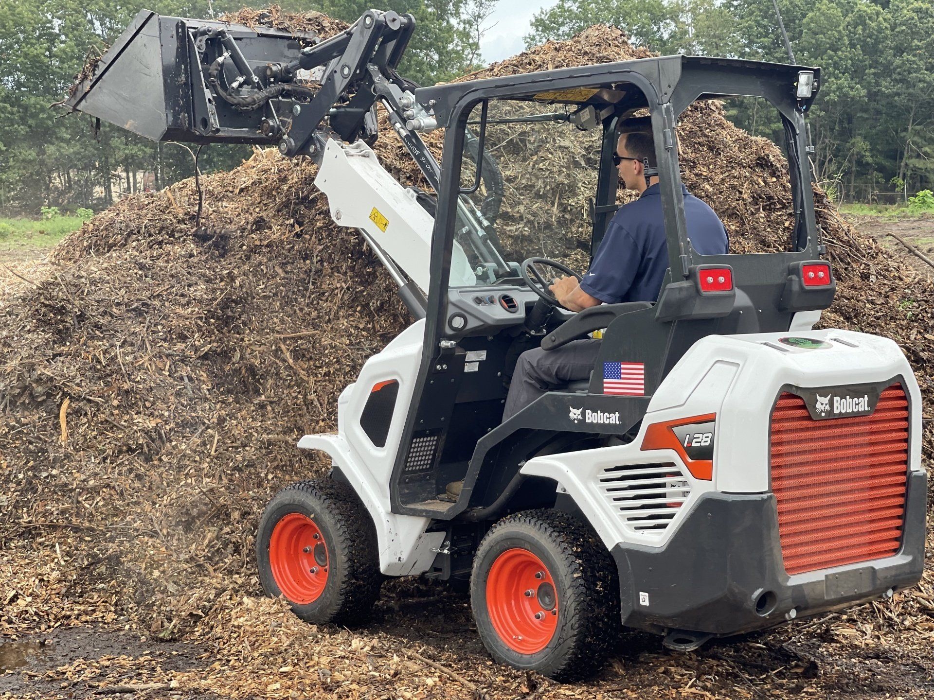 Commercial Land Clearing in Southington, CT Connecticut Landscape Solutions with BobCat L28