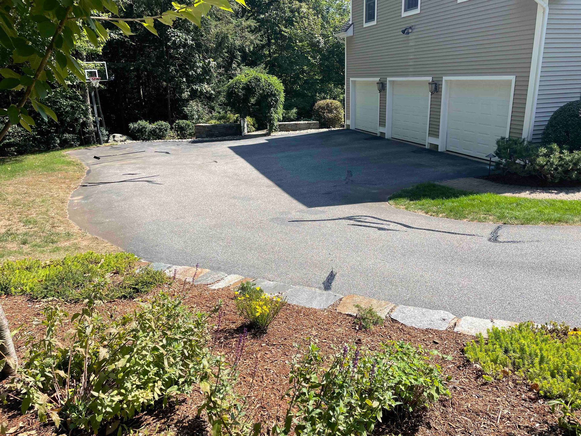 Crack filling older sun faded driveway  need or repair, Connecticut Landscape Solutions