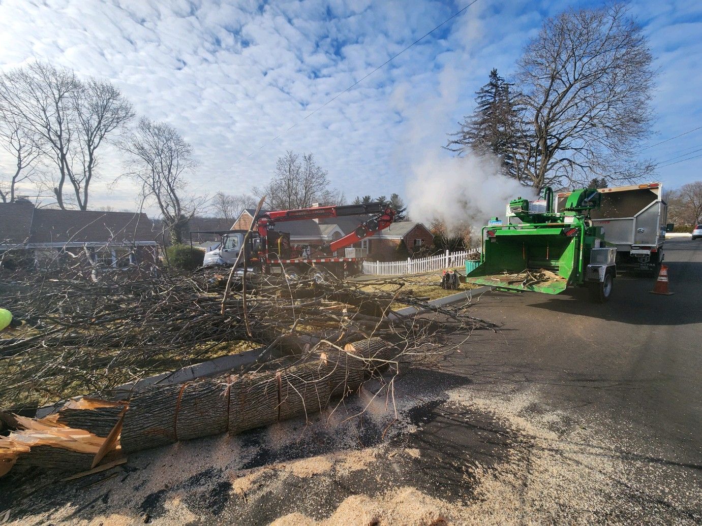 Tree Work Equipment including crane and chipper truck in West Hartford, Connecticut Landscape Solutions