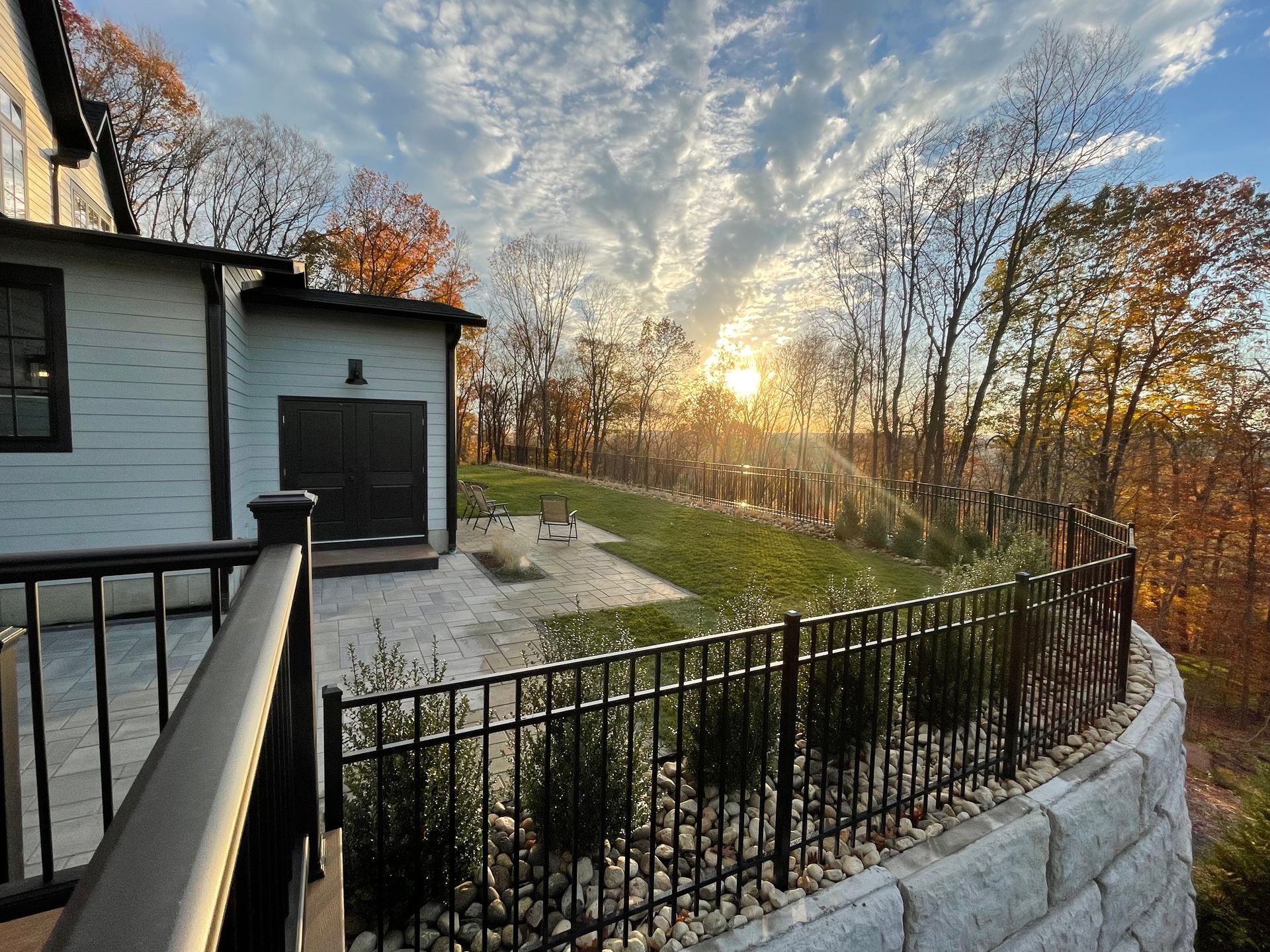 Techobloc Blu60 Patio with Steeds Holly Hedge and Newly Installed Sod in Simsbury, Connecticut
