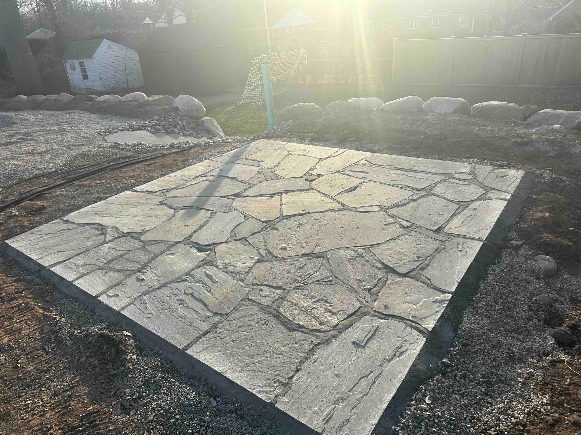 natural cleft irregular bluestone patio installed in West Hartford, CT