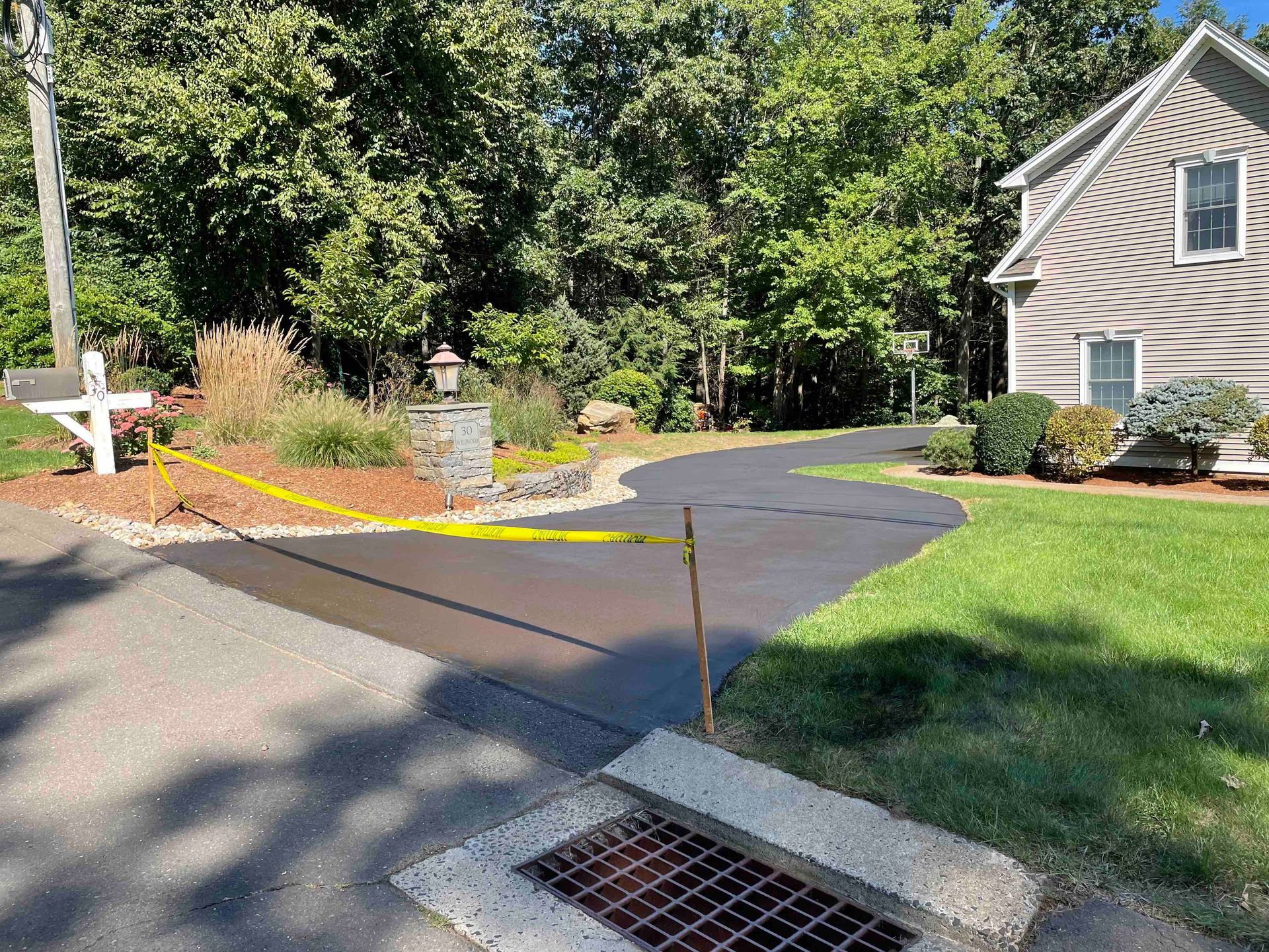 after latex seal coating application job in west hartford, Connecticut Landscape Solutions