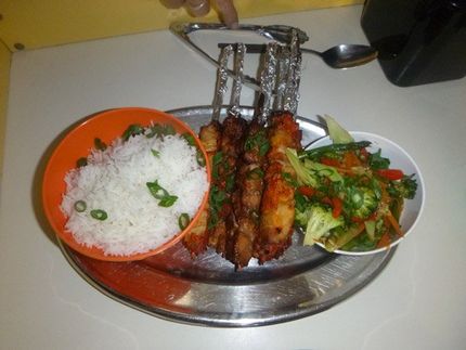 chicken skewers with rice and veggies