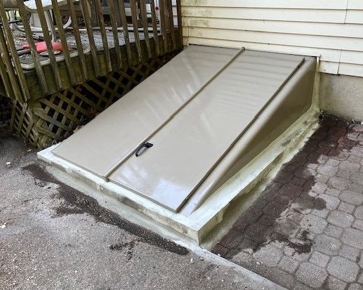 A door that is sitting on the side of a building.