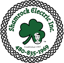 Logo for Shamrock Electric Inc., featuring a green shamrock within a Celtic knot circle and company name in green text.