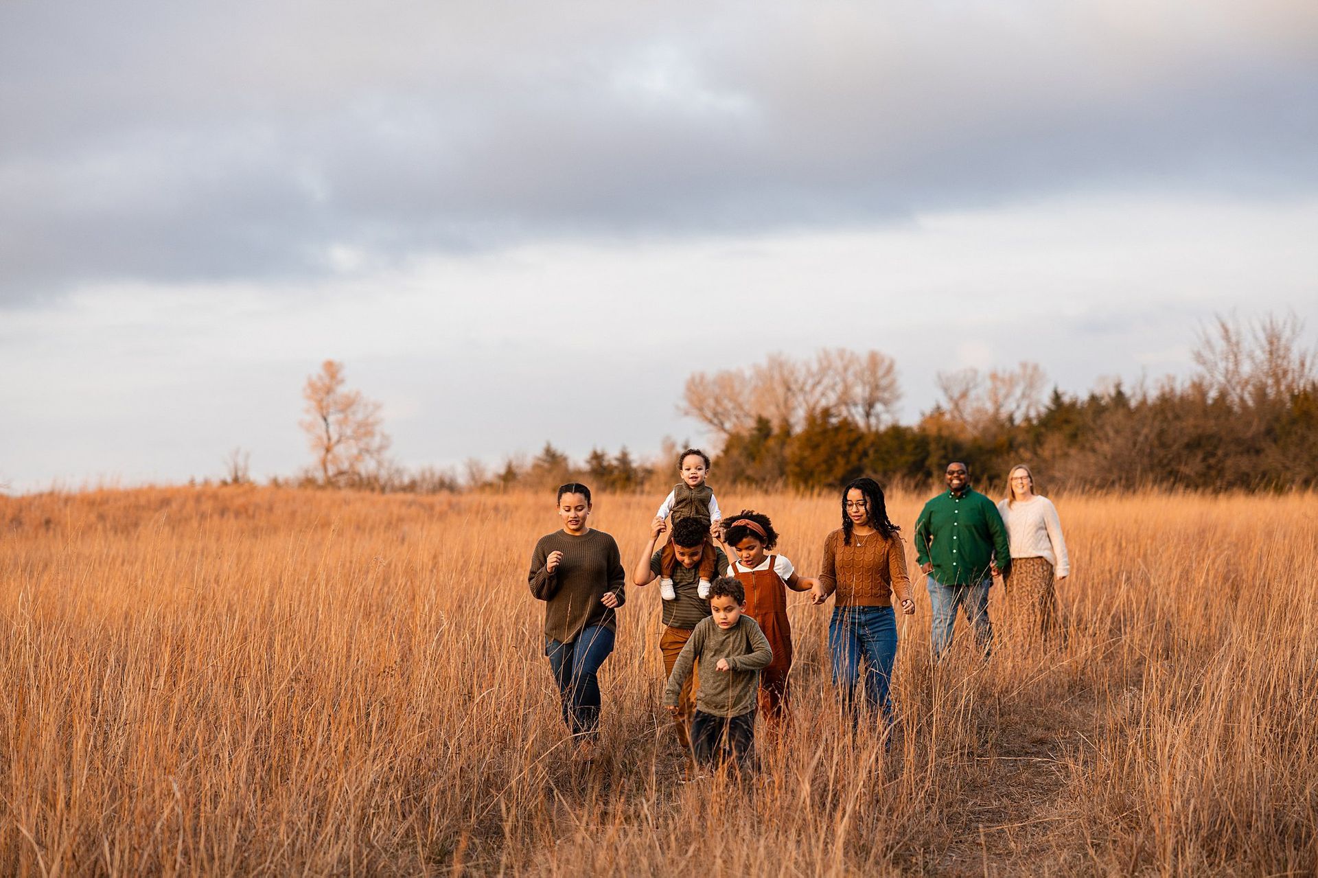 Playful unposed family laughing unposed and walking at farm mini session Burrton KS Sara McMillian Photography