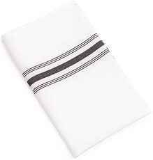 A white towel with black stripes on it on a white background.