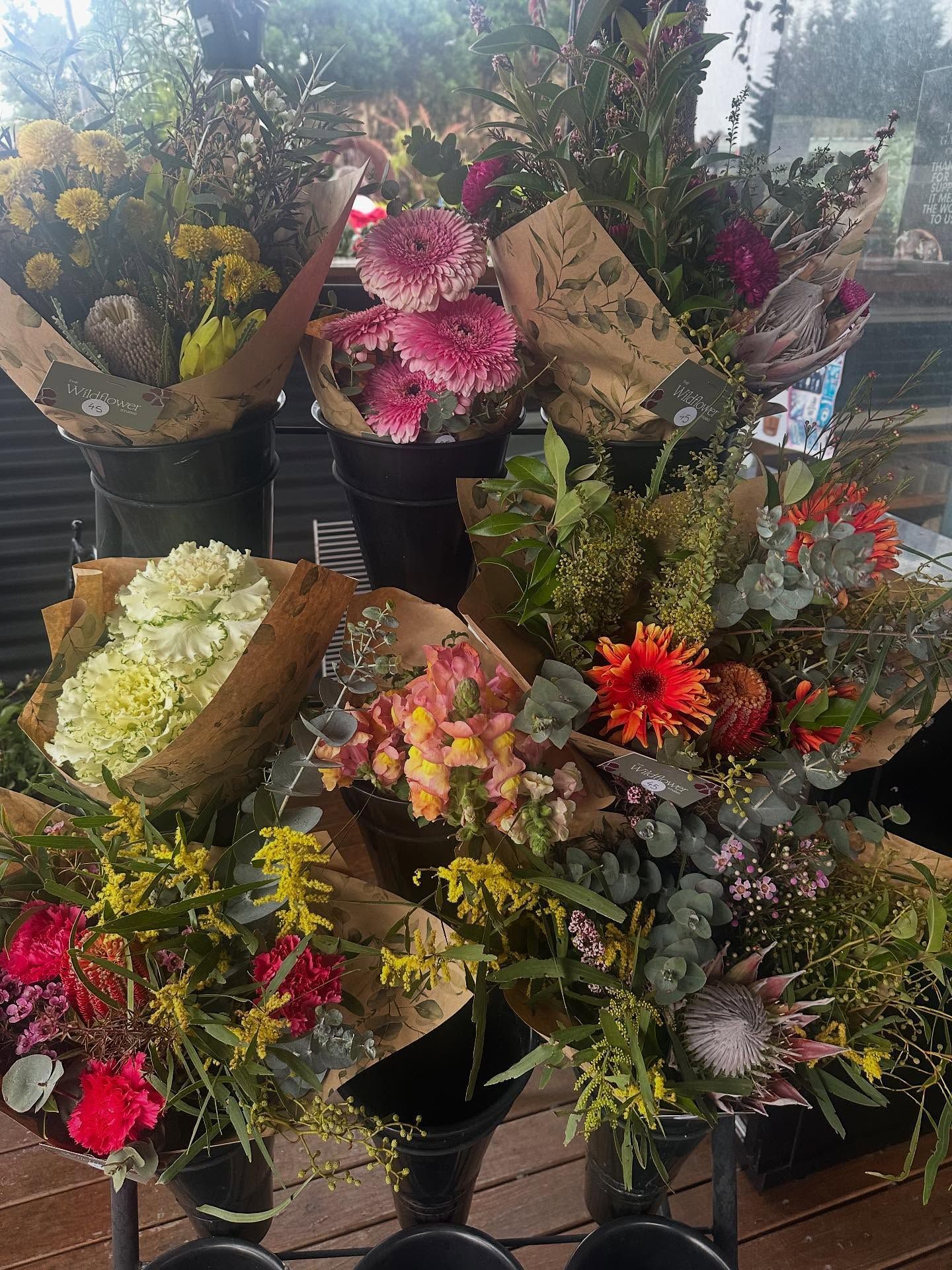 Bouquets of Colorful Flowers Wrapped in Brown Paper — Burnetts On Barney in Kiama, NSW