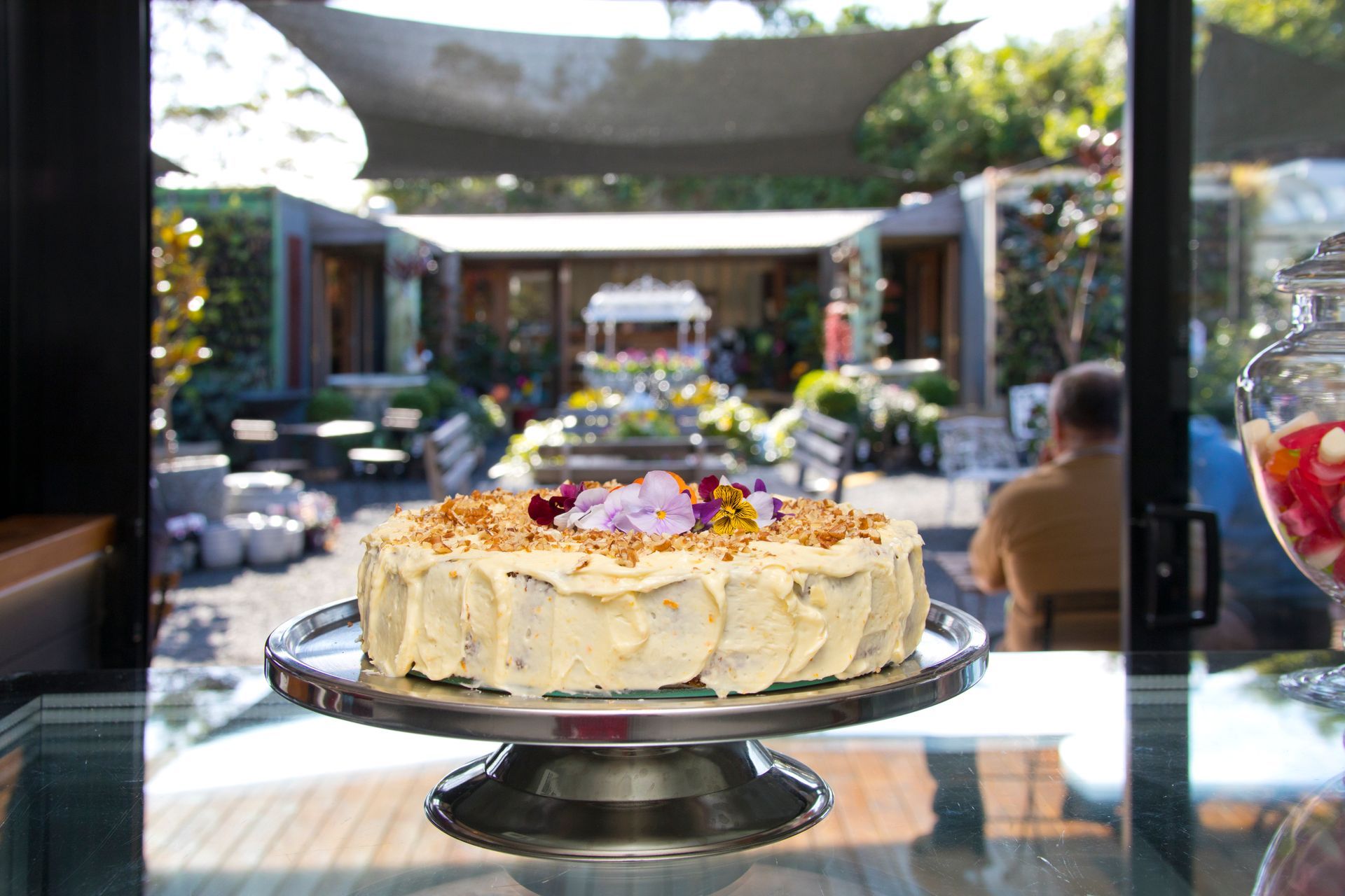 A Piece of Cake With a Flower on Top — Burnetts On Barney in Kiama, NSW