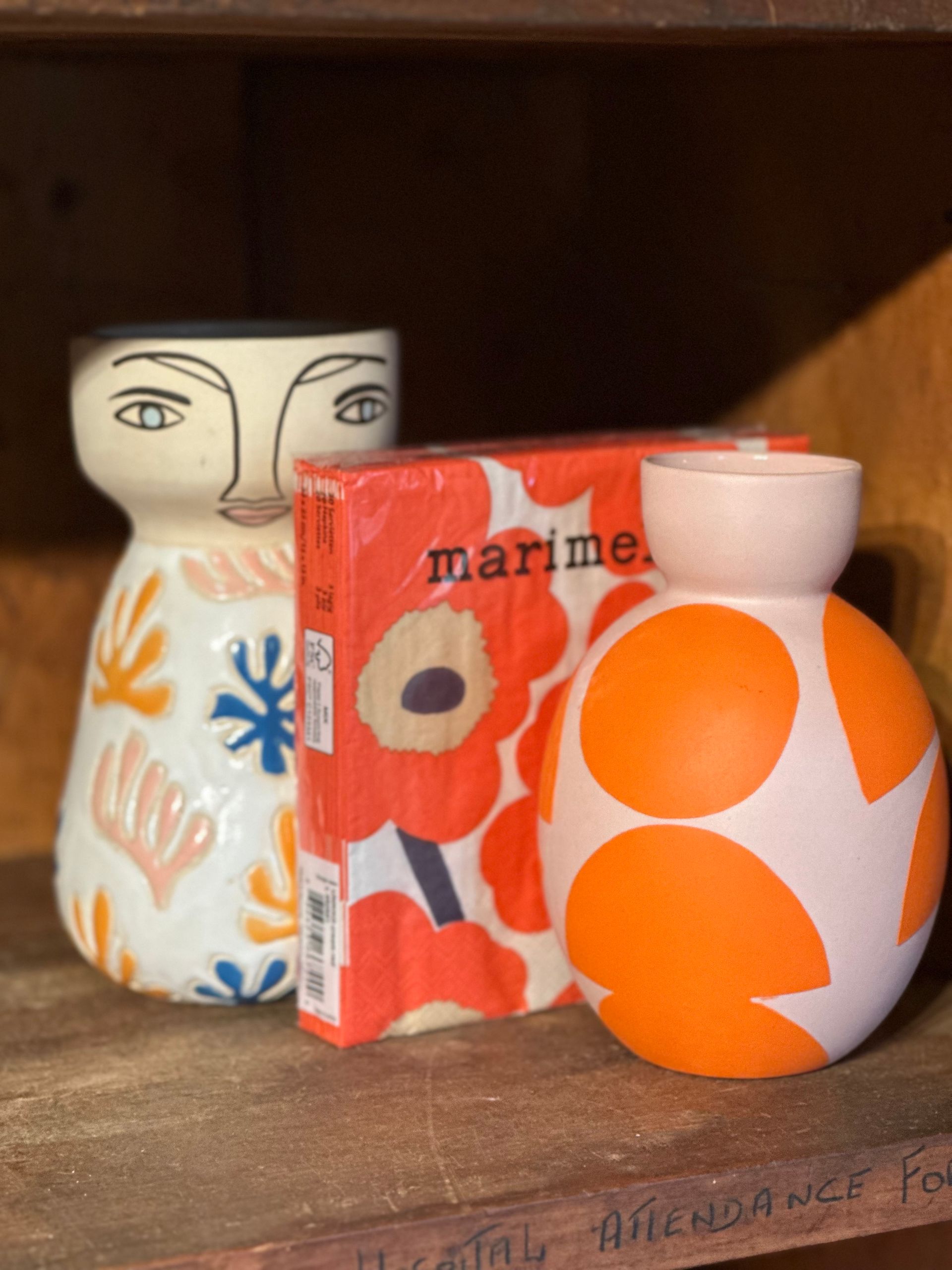 Three Vases Are Sitting On A Shelf Next To A Box Of Marimekko Napkins — Burnetts On Barney in Kiama, NSW
