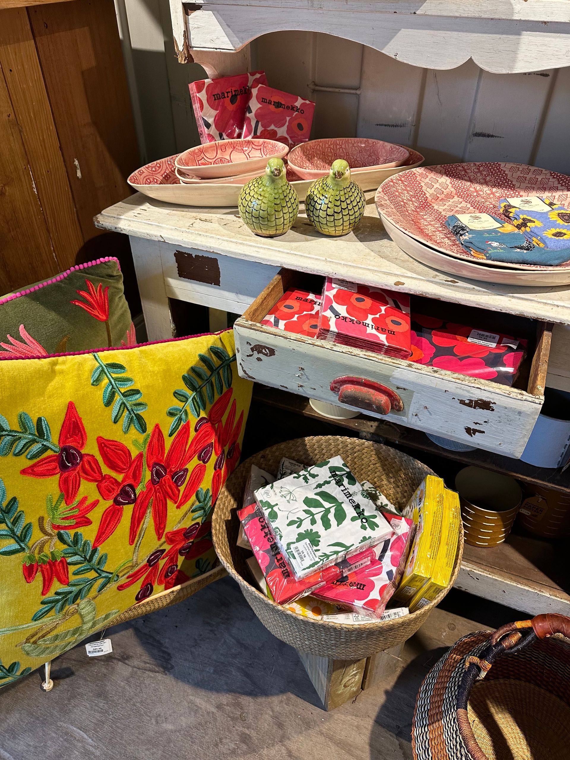 A Table With A Bunch Of Plates And Pillows On It — Burnetts On Barney in Kiama, NSW