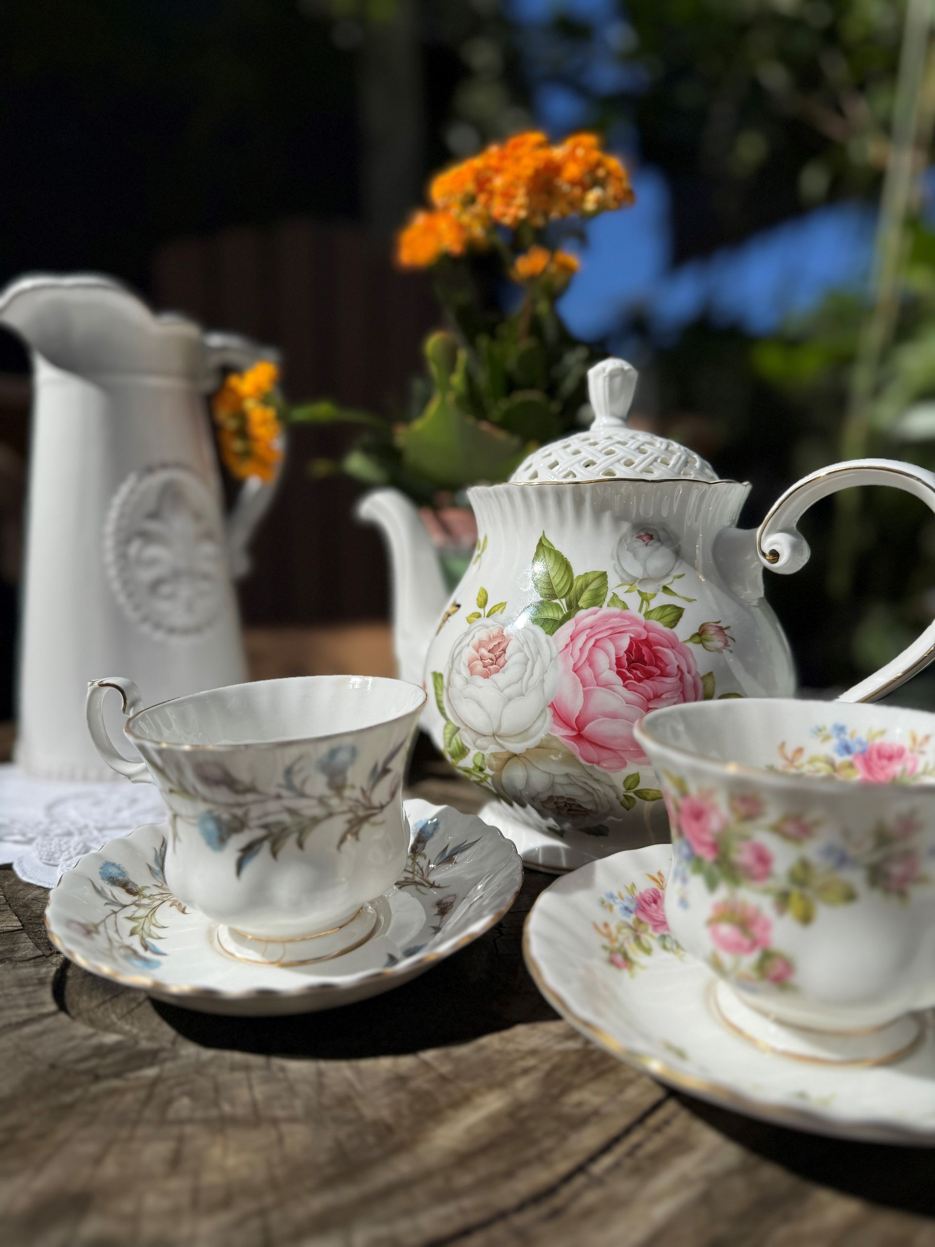 <p class="rteBlock">Floral Teacups and A Teapot on A Rustic Table in Sunlight — Burnetts On Barney in Kiama, NSW</p>