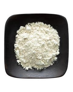 A black plate topped with a pile of white powder.