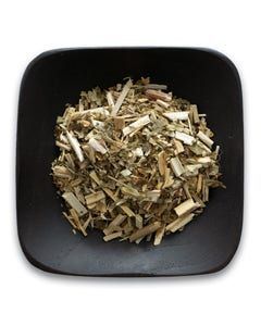 A black bowl filled with dried herbs on a white background.
