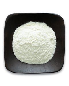 A black plate topped with a pile of white powder.
