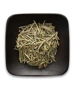 A wooden bowl filled with dried rosemary leaves on a white background.