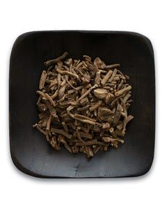 A black bowl filled with dried mushrooms on a white background.