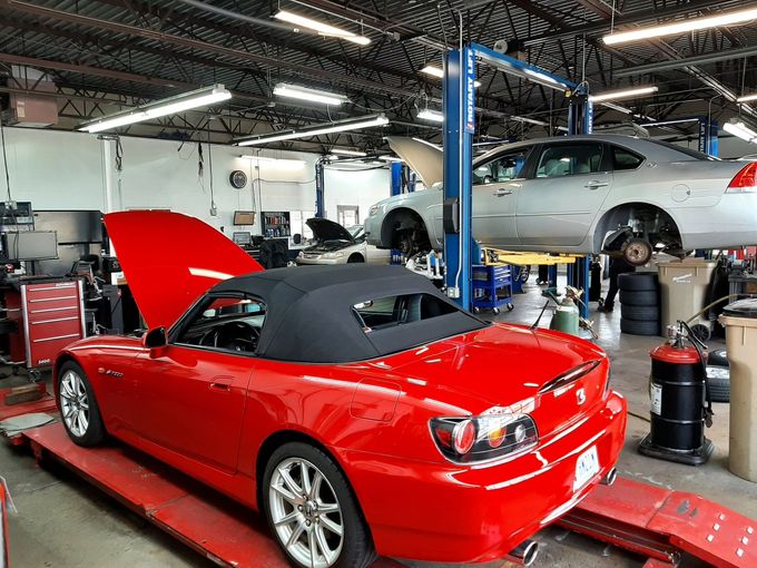 mechanic working on cars