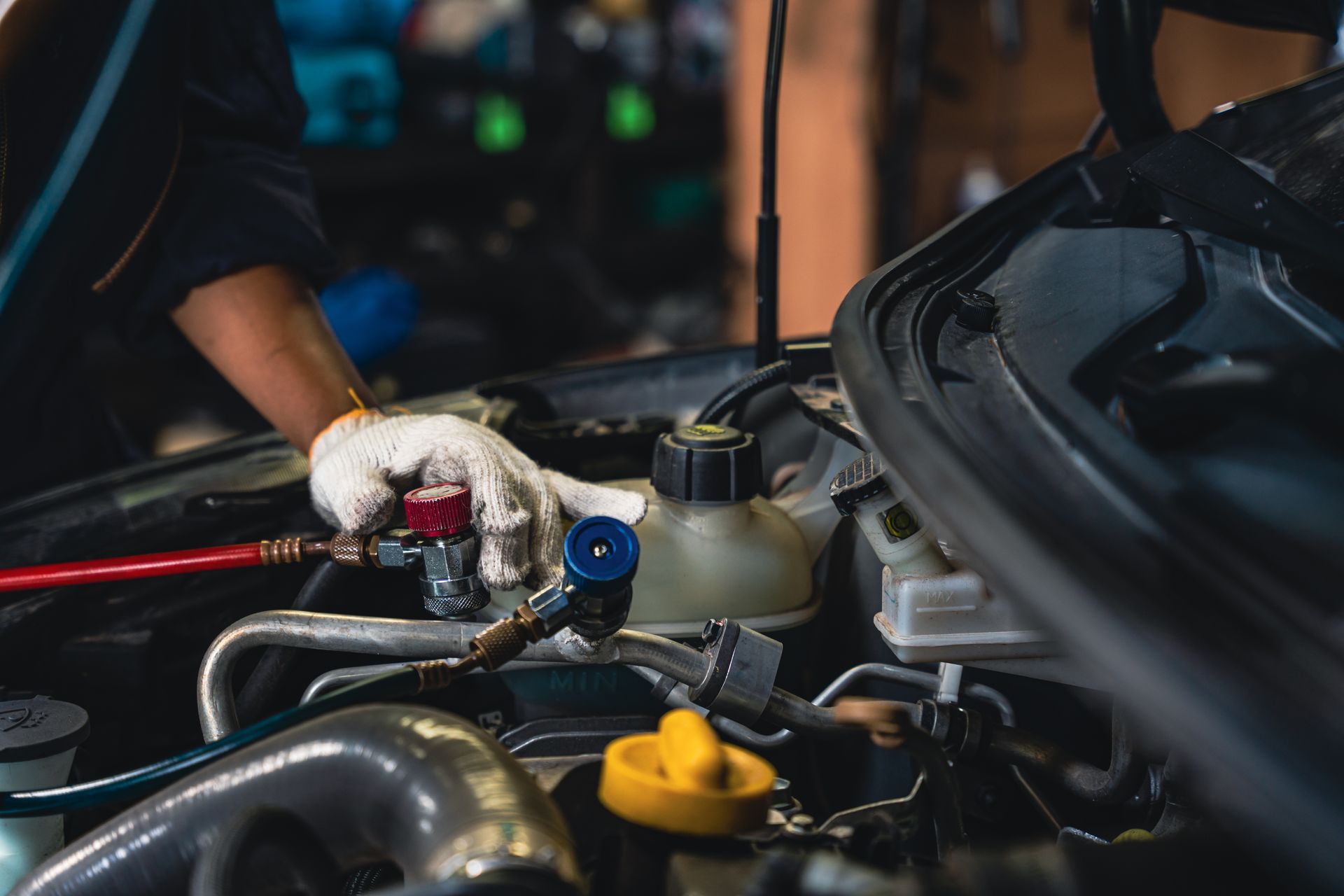 Vehicle’s AC Refrigerant Recharge Service in Grand Rapids | Auto Centric