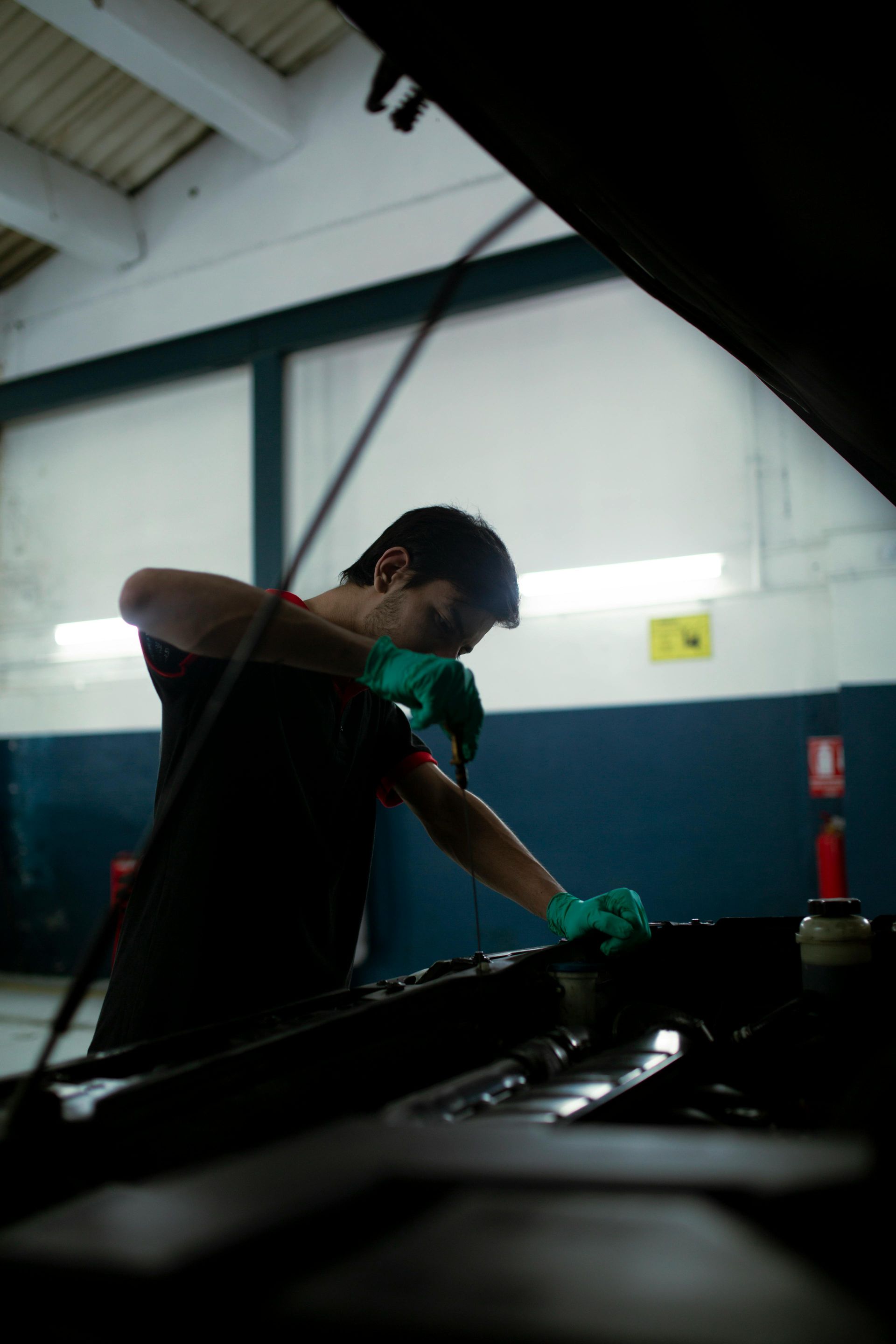 checking oil dipstick
