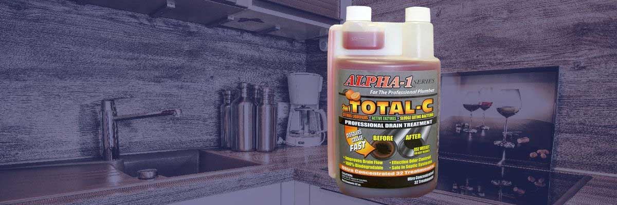 A bottle of liquid is sitting on a counter in a kitchen.