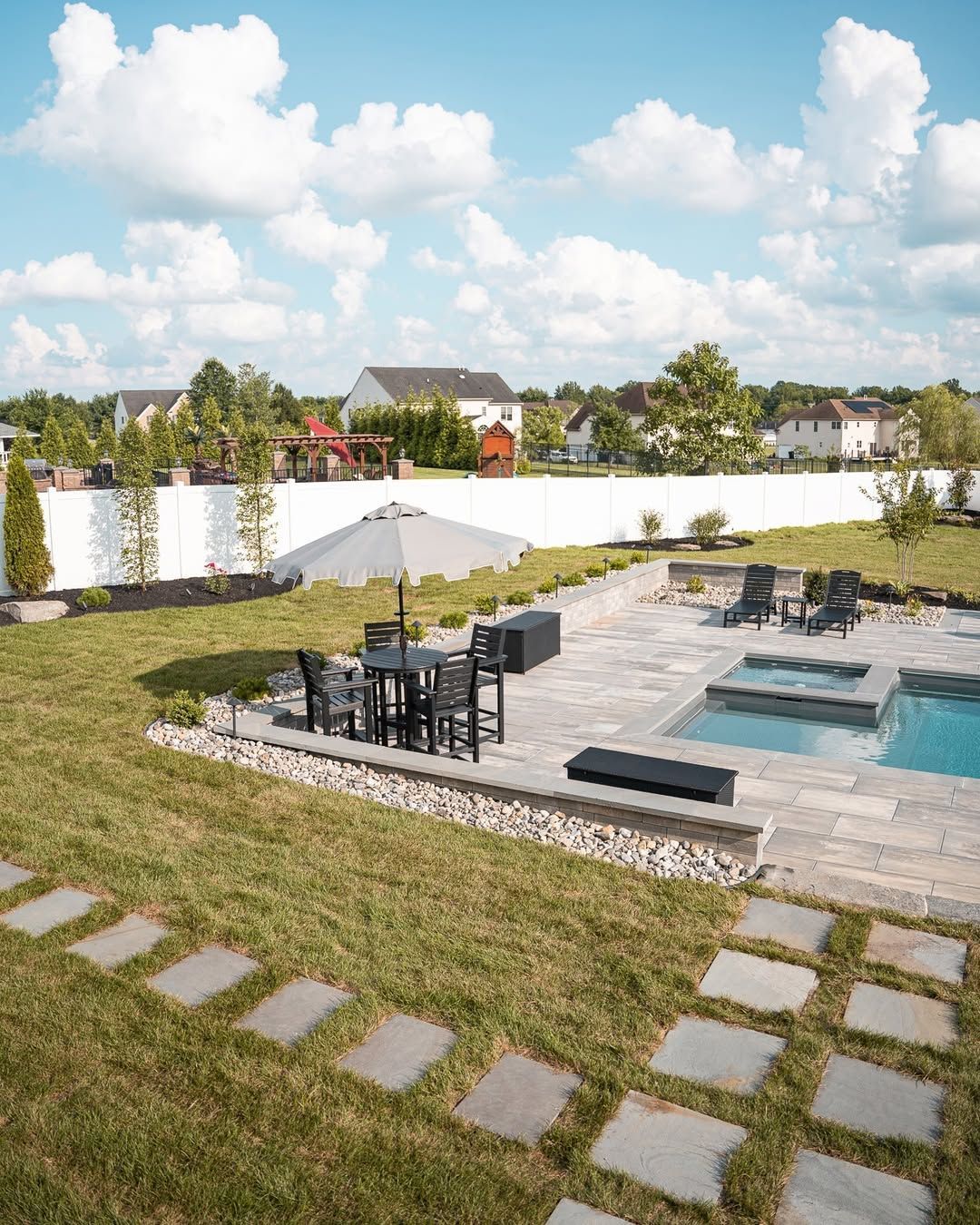 A greenhouse filled with lots of plants and flowers.